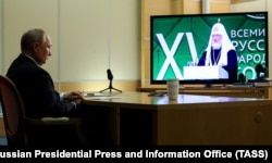 Російський президент Володимир Путін дистанційно бере участь у Всесвітньому російському народному соборі, листопад 2023 року