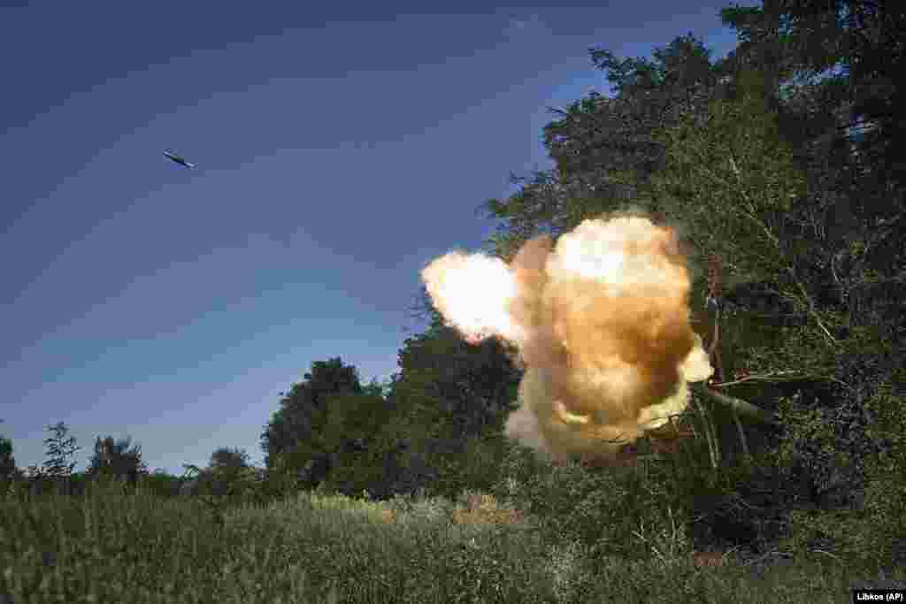 Ukrainian soldiers fire a self-propelled howitzer toward Russian positions at the front line in the Donetsk region on August 9. After months of preparations and resupply -- with as many as nine newly constituted, NATO-trained armored brigades -- Ukraine's counteroffensive to break through Russia's multilayered defenses is going slowly.
