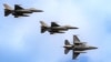F-16 fighter jets of the Romanian Air Force perform a fly by at the Black Sea, Defense, Aerospace and Security (BSDA) international exhibition in Bucharest, Romania, May 22, 2024.
