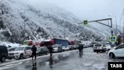 RUSSIA - Cars and heavy trucks are lined up near the Upper Lars border crossing with Georgia, November 21, 2023.