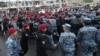 Armenia - Security forces disperse opposition protesters blocking a street in Yerevan, May 2, 2022.
