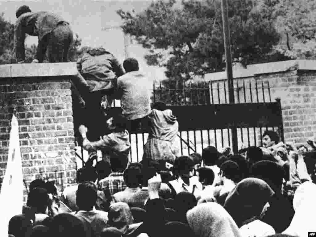 The final seizure of the U.S. Embassy in Tehran began on November 4, 1979, when some 400 radical Iranian students stormed through the gates and climbed over the walls. The students demanded that the Shah of Iran be extradited from the United States, where he had fled to receive medical treatment. The shah had expelled Khomeini in 1964.