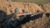 Nagorno-Karabakh - An Armenian soldier shoots during a military exercise, 20Nov2015.