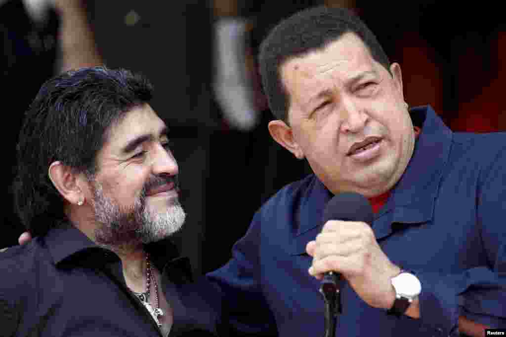 Chavez welcomes Argentina's soccer coach Diego Maradona at Miraflores Palace in Caracas in July 2010.