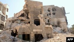 Many buildings have been reduced to rubble following heavy fighting between Syrian government troops and rebel forces in Aleppo.