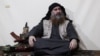 Абу Бакр аль-Багдадинин апрель айында тараган видеосунан алынган сүрөт. 