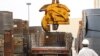 Iran – A worker (labor) in steel factory in Ghom, Apr2011 