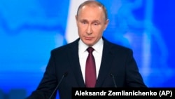 Президент России Владимир Путин выступает с посланием Федеральному собранию. В своей речи Путин назвал обвинения в адрес Москвы в невыполнении договора надуманными. Москва, 20 февраля 2019 года.