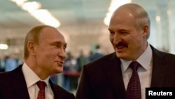 Уладзімер Пуцін і Аляксандар Лукашэнка на саміце ў Менску