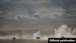 Nagorno-Karabakh - Tanks fire live rounds during a military exercise, 23Oct2012.