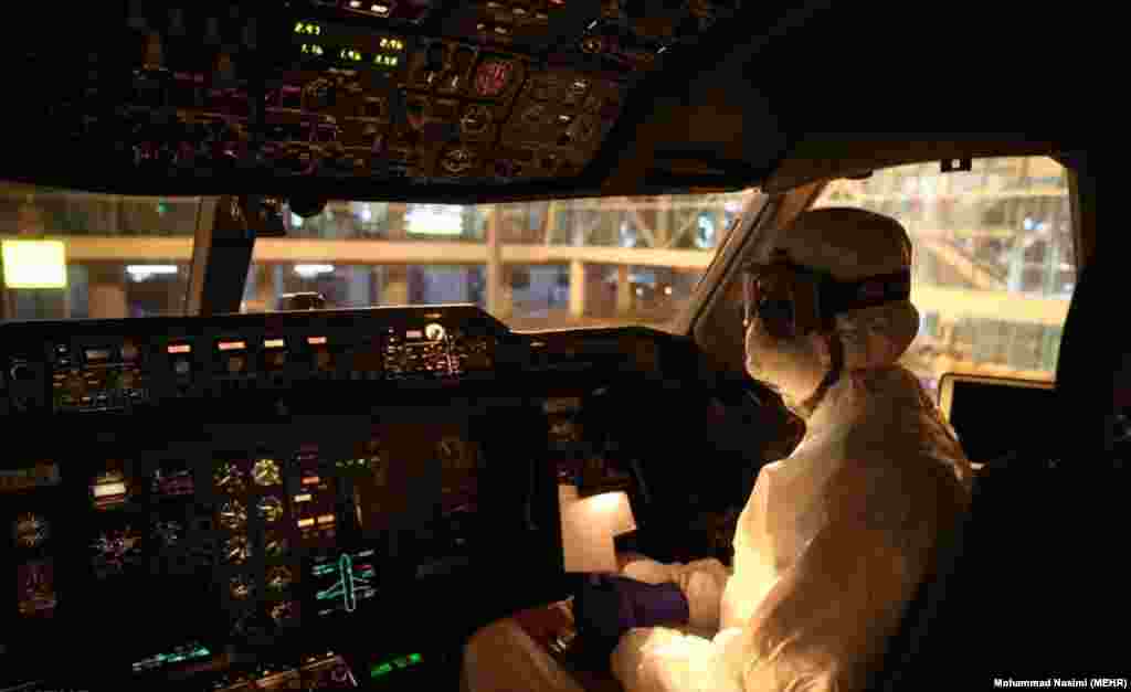 A crew member on a flight carrying Iranian students home from Wuhan. 