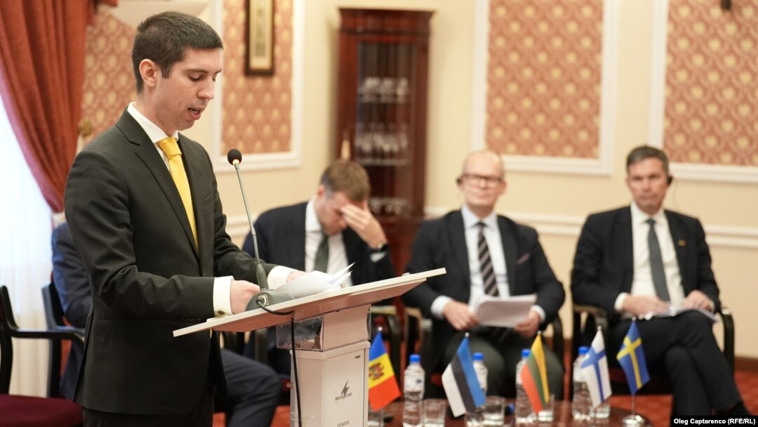 Moldovan Foreign Minister Mihai Popsoi (left) addresses his visiting counterparts from the Nordic-Baltic 8 group in Chisinau on October 15.
