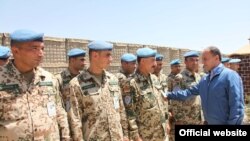 Armenia -- Defense Minister Seyran Ohanian inspects Armenian troops in Afghanistan, 24July 2010.