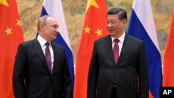 Рускиот претседател Владимир Путин и кинескиот колега Си Џинпинг