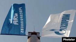 Armenia -- The flags of the ARG national gas operator and its dominant Russian shareholder, Gazprom, undated.