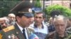 Armenia - Retired Colonel Volodya Avetisian (L) and other war veterans talk to journalists during a demonstration in Yerevan, 13May2013.
