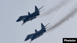 Armenia - Russian MiG-29 fighter jets fly over the Erebuni airbase in Yerevan, 12Feb2016.