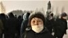 Kazakh activist Saule Seidakhmetova taking part in protests earlier this year. 