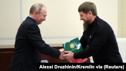 Президентан Путин Владимиран а, Нохчийчоьнан урхалхочун Кадыров Рамзанан а цхьаьнакхетар. Москвана йистера резиденци, 2018 шо марсхьокху-беттан 15-гIа де
