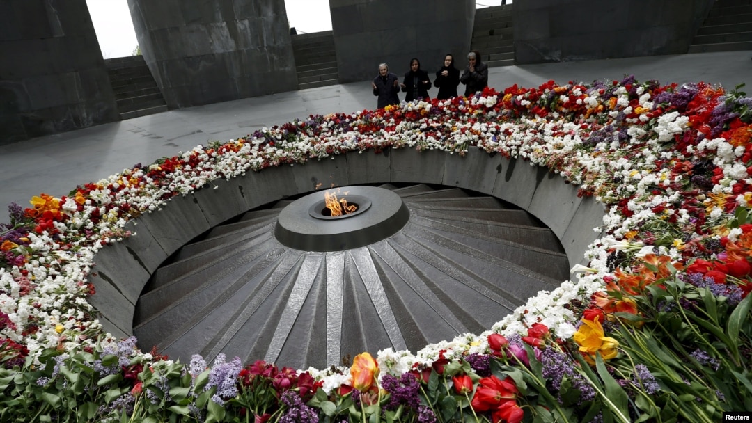 People mourn at the Tsitsernakaberd Armenian Genocide Memorial Museum in Yerevan on April 21.