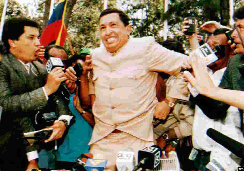 Chavez talks to reporters after being freed from jail on March 26, 1994.
