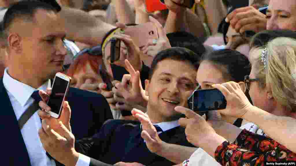 Zelenskiy takes selfies with supporters. The 41-year-old actor and comedian had no previous political experience before running for president.