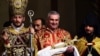 Armenia - Billionaire Samvel Karapetian (C) takes part in a Christmas Mass at the Armenian Apostolic Church's main cathedral in Echmiadzin, 6Jan2015.