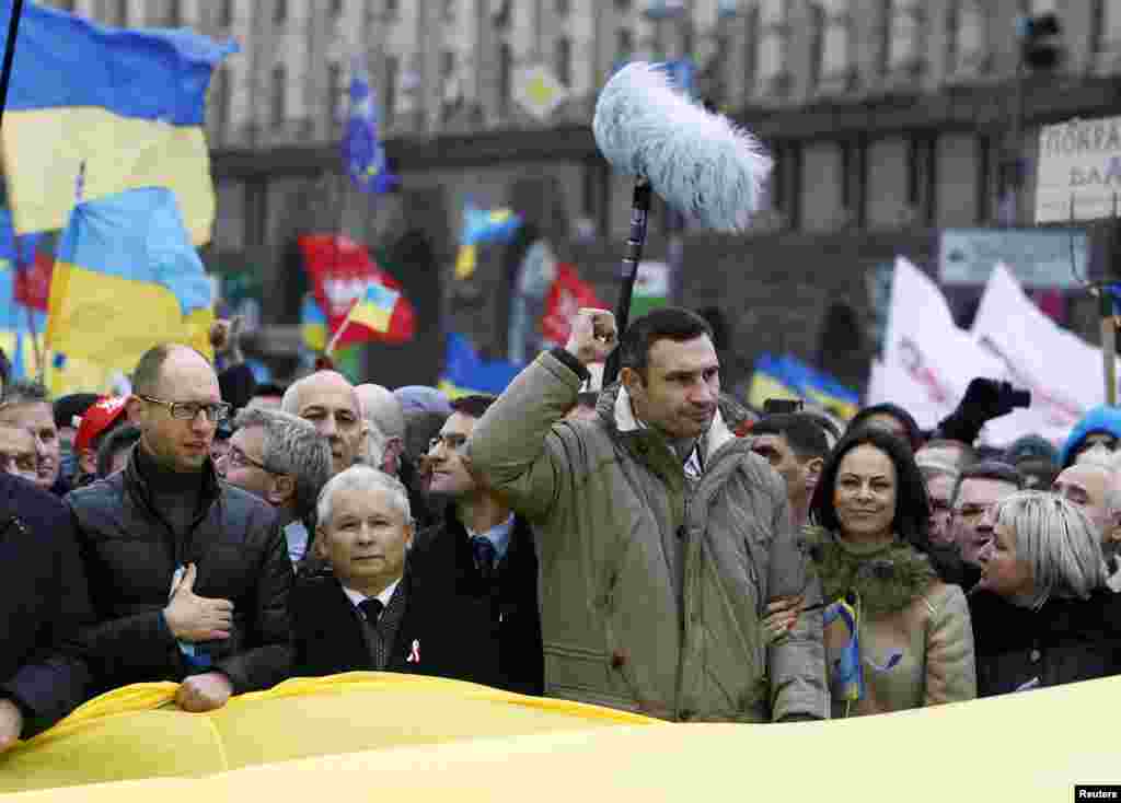 Opposition leaders attend the rally in Kyiv. From left to right. Arseny Yatsenyuk, a Ukrainian opposition leader; Jaroslaw Kaczynski, leader of Poland's main opposition Law and Justice Party and Vitali Klitschko, heavyweight boxing champion and UDAR (Punch) opposition party leader.