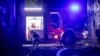Спасатель отдыхает после тушения пожара, возникшего в результате российского удара, Киев, 4 мая 2025 года