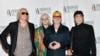R.E.M. band members Peter Buck (left), Mike Mills (second left), Michael Stipe (second right), and Bill Berry attend the Songwriters Hall of Fame Induction and Awards Gala in New York last year. 