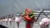 Cvijeće na kamionu sa žrtvama genocida u Srebrenici, 9. jul 2011.