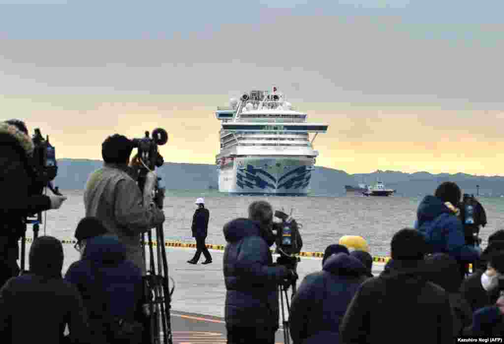 The Diamond Princess is currently moored off the port of Yokohama, Japan with police vessels patrolling to stop civilians from getting too close. 