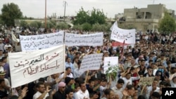 Syrian antiregime protesters in the central province of Homs