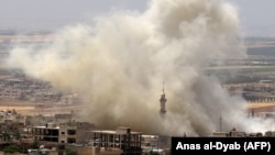 تصویری از حمله هوایی در شهرک خان شیخون در استان ادلب