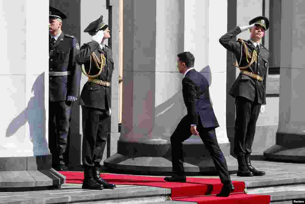 Zelenskiy heads into the building of Ukraine's parliament, the Verkhovna Rada.