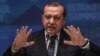 Turkey -- Turkish President Recep Tayyip Erdogan speaks during a press conference after the closing session of the 13th summit of the Organization of Islamic Cooperation (OIC) at Istanbul's Congress Center (ICC), April 15, 2016