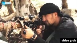 FILE: Former Tajik special forces officer Gulmurod Halimov is among the thousands of Central Asians are believed to have traveled to Iraq and Syria to fight alongside extremist groups, such as Islamic State.