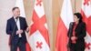 ანდჟეი დუდა და სალომე ზურაბიშვილი თბილისის აეროპორტში. 