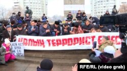Protesters rally in Almaty on February 13 to demonstrate against human rights abuses during last month's unrest in Kazakhstan.