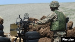 Armenia - A soldier at a new Armenian army post on the border with Azerbaijan, June 16, 2021.
