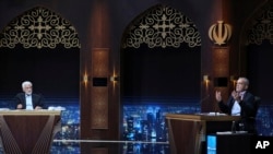 د ایران د ولسمشرۍ ټاکنو کاندیدان سعید جلیلي او مسعود پزشکیان