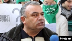 Armenia - Rafik Atayan, mayor of Kajaran village, takes part in an environmental protest in Yerevan, 29Dec2011.