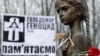 Скульптура дівчинки з колосками в руках на території Національного музею Голодомору-геноциду, в якому зібрані численні документальні матеріали про Голодомор-геноцид в Україні 1932–1933 років 