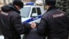 Новосибирск: на активиста с плакатом о Путине завели уголовное дело