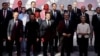 Leaders from the countries in Ukraine's "coalition of the willing" pose for a family picture during a summit in Paris on March 27.