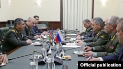 Russia - Defense Minister Sergey Shoygu (R) meets with his Azerbaijani counterpart Zakir Hasanov in Moscow, 15June2016.