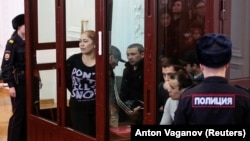 The bombing suspects attend a court hearing on April 2. 