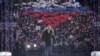 Vlagyimir Putyin orosz elnök részt vesz a Krím Oroszország általi annektálásának hetedik évfordulója alkalmából rendezett koncerten Moszkvában, a Luzsnyiki Stadionban, 2021. március 18-án