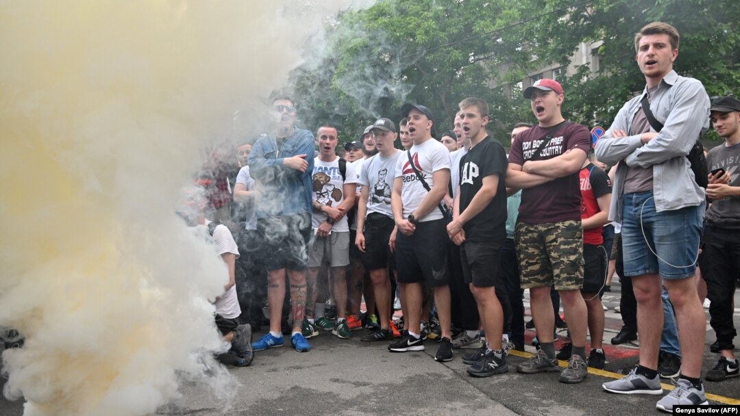 People gather for a protest in front of the Interior Ministry in Kyiv after a 5-year-old boy was fatally shot by two police officers.