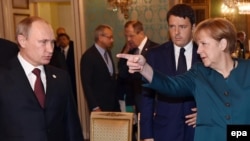 Vladimir Putin i Angela Merkel